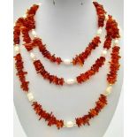 A natural Baltic amber (cognac coloured) and Scottish fresh water pearls, opera length necklace.