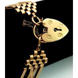 A Vintage 9K Yellow Gold Fancy Gate Brick Design Bracelet. Heart padlock and safety chain. 20cm. 27.
