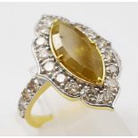 A 3.8ct Marquise Shape Diamond With a Halo of 1.14ct Diamonds in solid Yellow 14k Gold. Size L1/2. 3