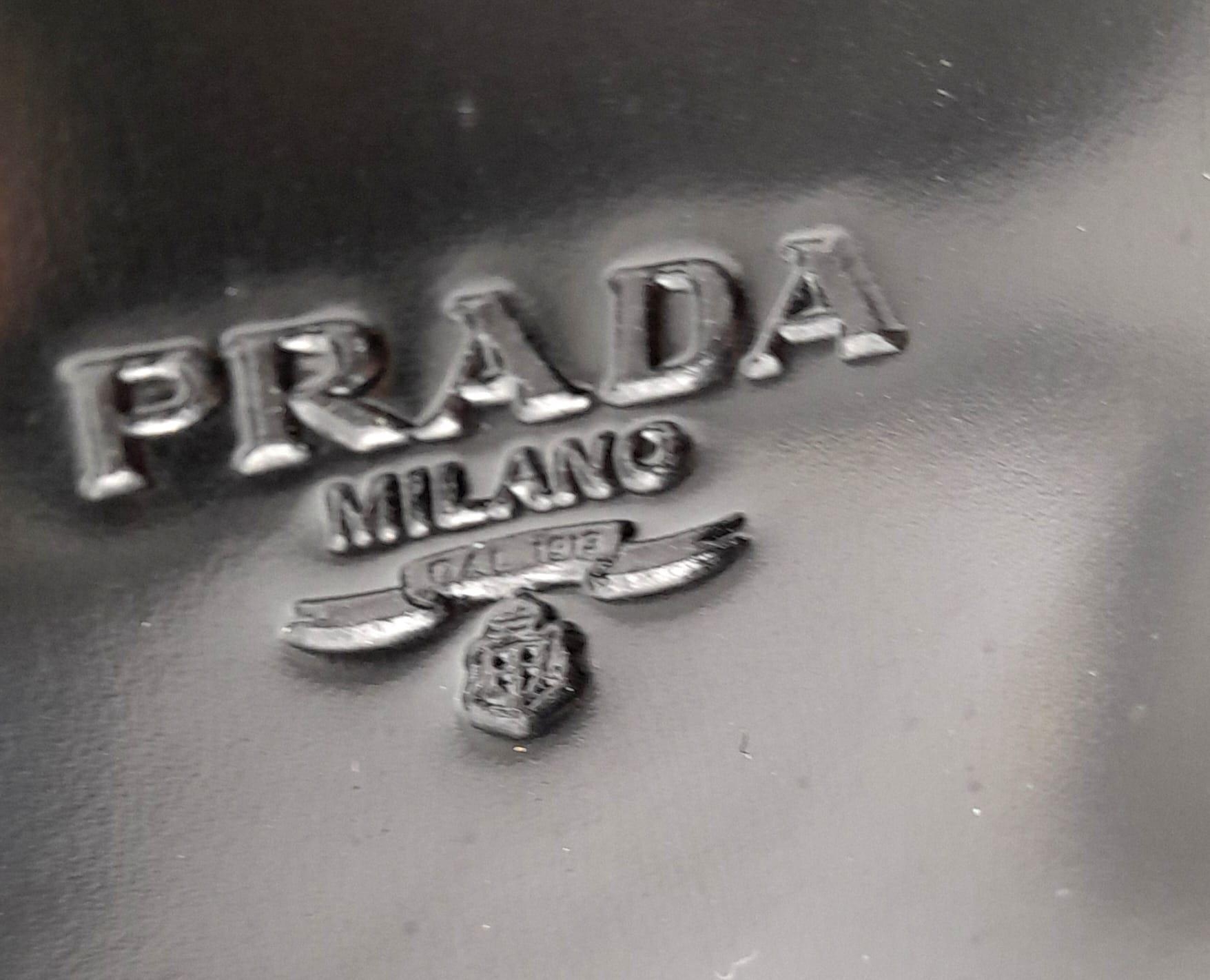 A Prada Patent Black Leather Shoulder Bag. Prada branding on exterior. Cloth monogram interior with - Image 5 of 5