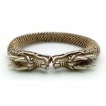 A vintage, Tibetan silver, Chinese Dragon bangle, in a presentation box. Size adjustable, weight:102