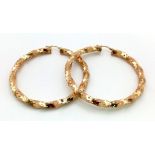Two 9K Yellow Gold Large Twist Creole Earrings. 6cm inner diameter. 7.1g total weight.
