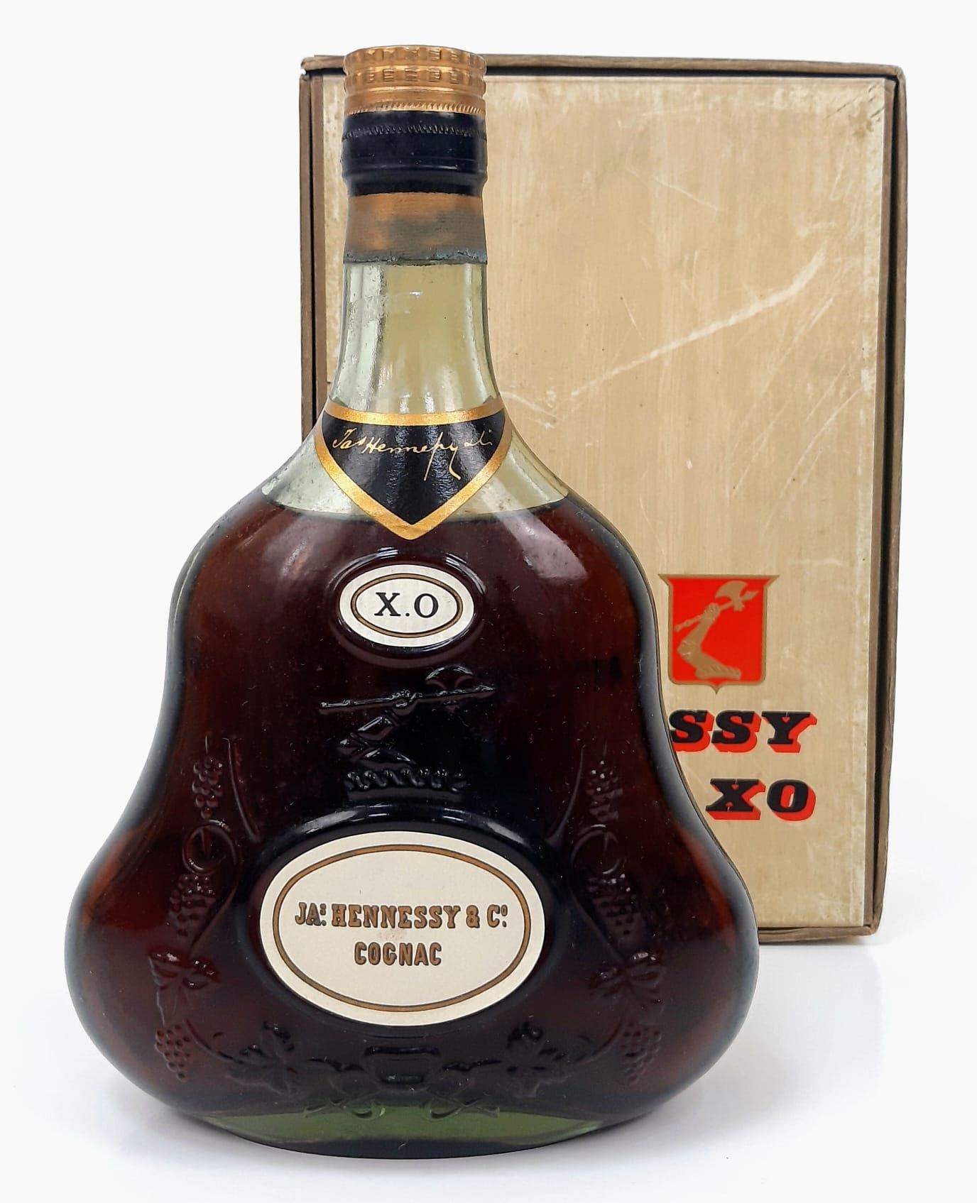 A bottle of Vintage 1960's Hennessy XO in original packaging