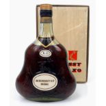 A bottle of Vintage 1960's Hennessy XO in original packaging