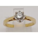 An 18K Yellow Gold Diamond Solitaire Ring. Brilliant round cut 0.4ct. Size M. 2.8g total weight.