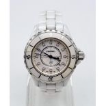 A Chanel J12 Quartz Ladies Watch. White ceramic strap and case - 33mm. White dial with diamond marke
