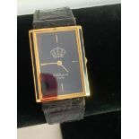 Vintage Gold Plated DUPONT Wristwatch. Having square face with black enamel detail. Golden digits an