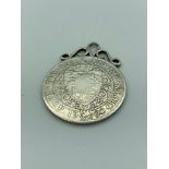 Victorian SILVER HALF CROWN 1900 fine condition,in pendant form with silver scroll mount to top.