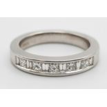 An 18K White Gold Diamond Half-Eternity Ring. 0.5ct Size M. 6g total weight. Ref: 119r