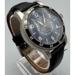 A gents BURBURRY watch. Case diameter: 42 mm, black calibrated rotating bezel, black face with