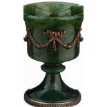 A Faberge nephrite jade cup, 20th century, the bell shape bowl with applied silver swags tied with