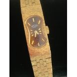 Ladies vintage ROTARY BRACELET WATCH in gold tone with figure of eight champagne dial. Manual
