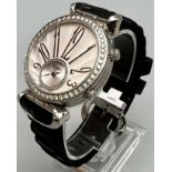 A Karloff Reversible Gents Quartz Watch. Black rubber strap. Stainless steel case - 36mm. Diamond