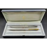 Two Vintage Stainless Steel Parker Ballpoint Pens. In a Parker case. A/F