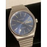 Extremely rare vintage LORER AUTOMATIC WRISTWATCH DAY/DATE model 1559LN in Silver tone .Having