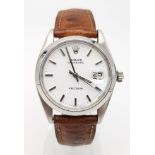 A Rolex Oysterdate Precision Gents Watch. Brown leather strap. Stainless steel case - 36mm. White