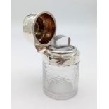 A Sterling Silver Collar and Topped Glass Condiment Bottle. 9cm tall. 356g total weight.