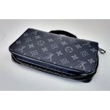 A Louis Vuitton Zippy XL Gents Wallet. Monogram grey exterior. Large middle zipped compartment.