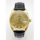 A Rolex Oyster Perpetual Datejust Tiffany and Co 18K Gold Watch. Black leather strap. 18k gold