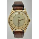 A Vintage 9K Gold Rotary Mechanical Gents Watch. Original leather strap. Gold case - 36mm. Two