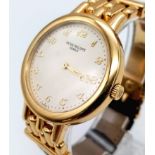 A Patek Phillipe 18K Gold Calatrava Gents Watch. Leather strap with 18k gold buckle and extender.