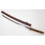 A WW2 Japanese Army Officers Katana Sword. The tang bears markings of the armoury makers signature
