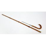 A Vintage Possibly Antique Toledo Small Flexible Bamboo Cane Stick with Hidden Dagger. 72cm total