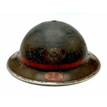 A WW2 Auxiliary Fire Brigade Helmet. Numbered 38 for the Wimbledon Region of London.