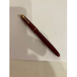 Vintage PARKER FOUNTAIN PEN in burgundy, having 14 carat gold nib. Pump filling. Some wear to