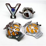 Four vintage car badges. Two AA badges, a vintage motorists association badge (45 years safe