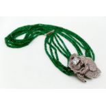 A very glamorous six strand faceted emerald necklace, with a majestic white metal (untested)