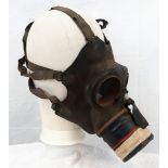 An Original WW2 British Homes Service Gas Mask - Dated 1939. Please see photos for conditions.