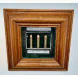 A Magnum Bullet Display Case - 41, 44 and 45 calibre. In frame - 15 x 15cm. All rounds are INERT.