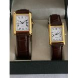 His & Hers Quartz WRISTWATCHES in Gold tone having square faces with sweeping second hands and