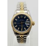 A Midnight-Blue Dial Rolex Oyster Perpetual Datejust Two-Tone Ladies Watch. Gold and steel strap and