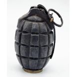 An INERT WW1 British No 5 MK1 Mills Grenade. Maker: Glover and Mail LTD Dated February 1916.