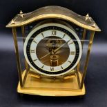 A Vintage German Junghans Brass ATO Mantel Clock. Electronic movement in working order. 17 x 20cm.