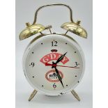 A VINTAGE SWAN LAGER DOUBLE BELL ALARM CLOCK. 17.5CM IN WORKING ORDER.