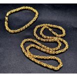 A Gorgeous Complex Inter-linking 18K Yellow Gold long Necklace and Bracelet Set. 56cm and 17cm. 31.