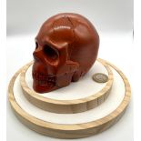 A 1.1 Kilo Natural Hand-Crafted Red Jasper Skull. A wonderful addition to your cabinet of