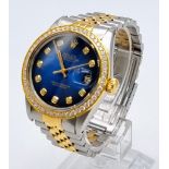 A Deep-Blue Dial Rolex Oyster Perpetual Diamond Datejust Gents Watch. Gold and stainless steel strap