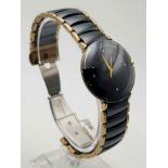 A Radu Ceramic Jubile Ladies Diamond Watch. Ceramic and steel strap and case - 30mm. Black dial with