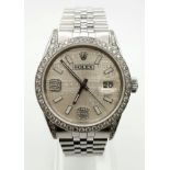 A Stainless Steel and Diamond Rolex. Stainless steel strap. Case - 36mm. Diamond bezel, lugs and