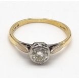 An 18K Yellow Gold Diamond Solitaire Ring. Size L 1/2. 0.25ct. 2.27g total weight.