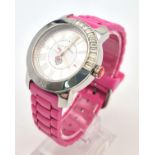 A Juicy Couture Ladies Quartz Watch. Pink rubber strap. Steel case - 38mm. In working order.