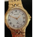 Gentlemans ACCURIST Quartz wristwatch model MBO10 in gold tone. Having white face with Roman