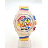 A Swatch Summer Curves Chronograph Watch. Multi-coloured strap and case. In good condition and
