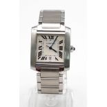 An Automatic Cartier Gents Tank Watch. Stainless steel strap and case. 30 x 33mm. White dial with