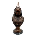 A Bronze Bust of Queen Victoria on a Circular Black Marble Base. 42cm tall.