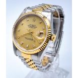 A ROLEX OYSTER PERPETUAL DATEJUST IN BI-METAL WITH DIAMOND NUMERAL AND GOLDTONE FACE. Case - 36mm